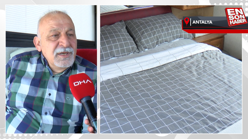 Antalya’daki emekli mimar, karavana çevirdiği yolcu otobüsünde yaşıyor